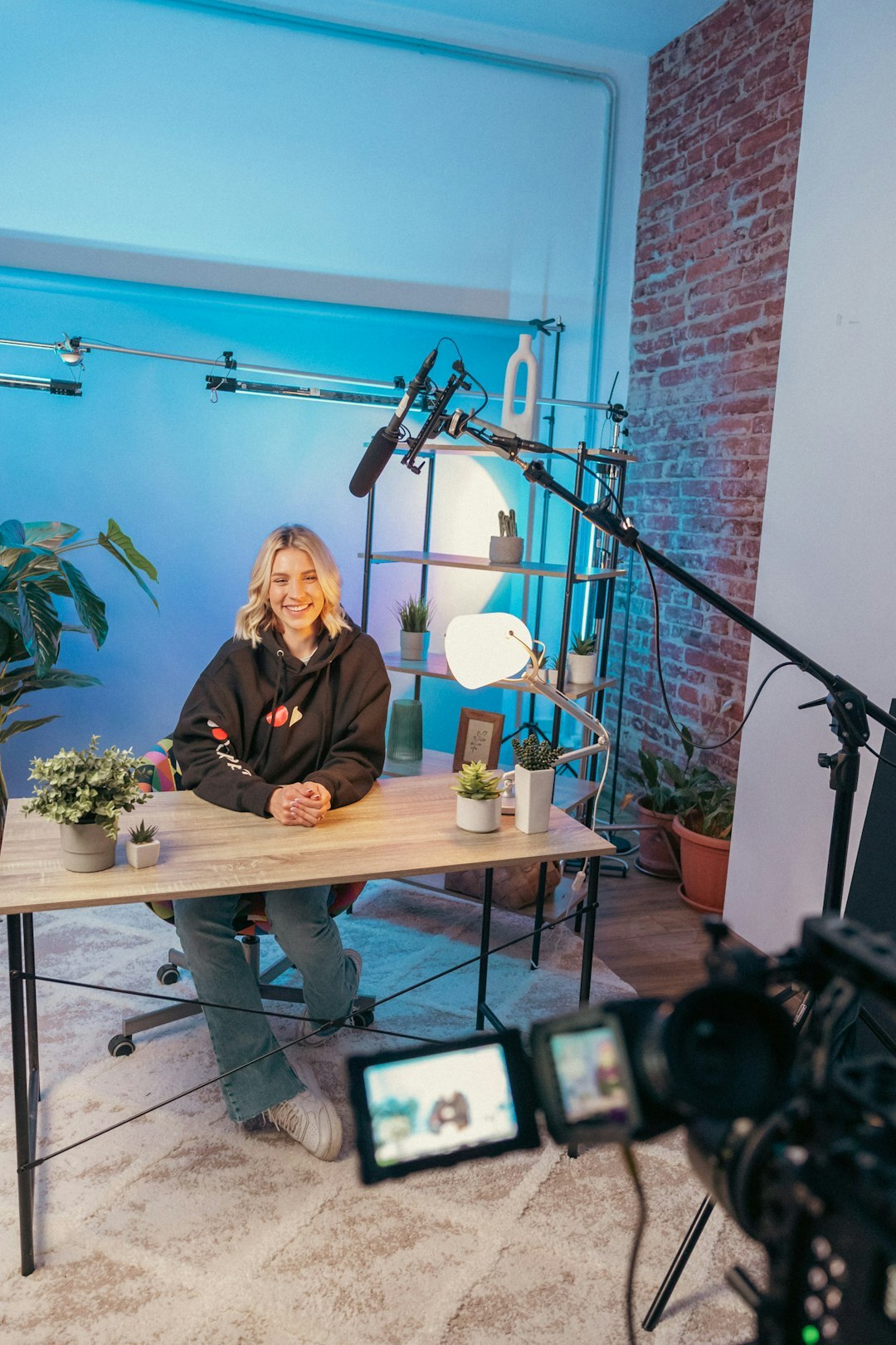woman writing notes on set